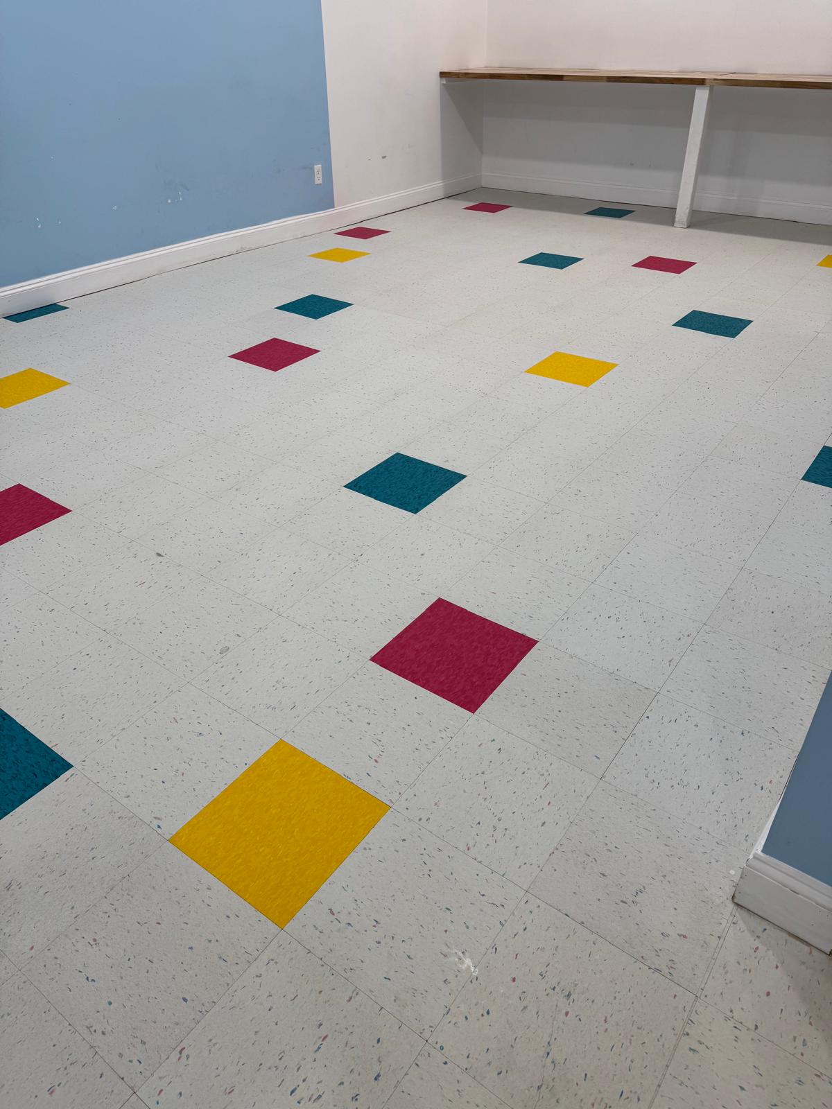 The same commercial tile floor bright and spotless after cleaning